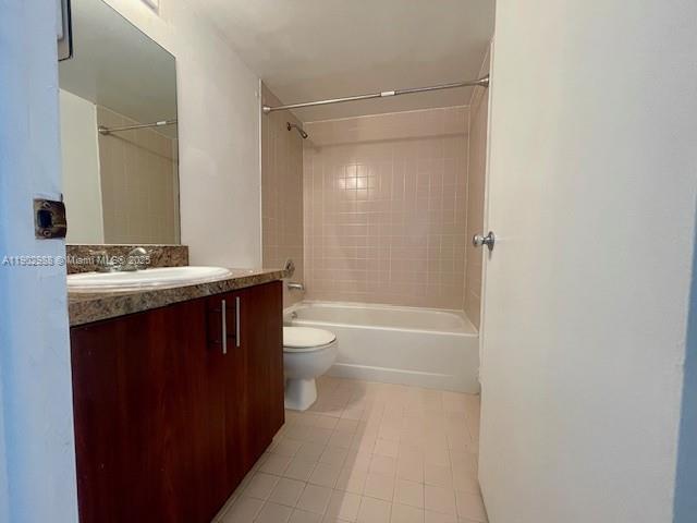 8260 Southwest 210th Street, Unit 311 Cutler Bay, FL 33189 - Photo 11 of 17 a bathroom with a sink a toilet and shower