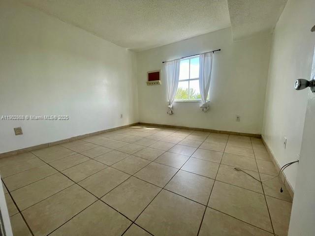 8260 Southwest 210th Street, Unit 311 Cutler Bay, FL 33189 - Photo 10 of 17 an empty room with windows
