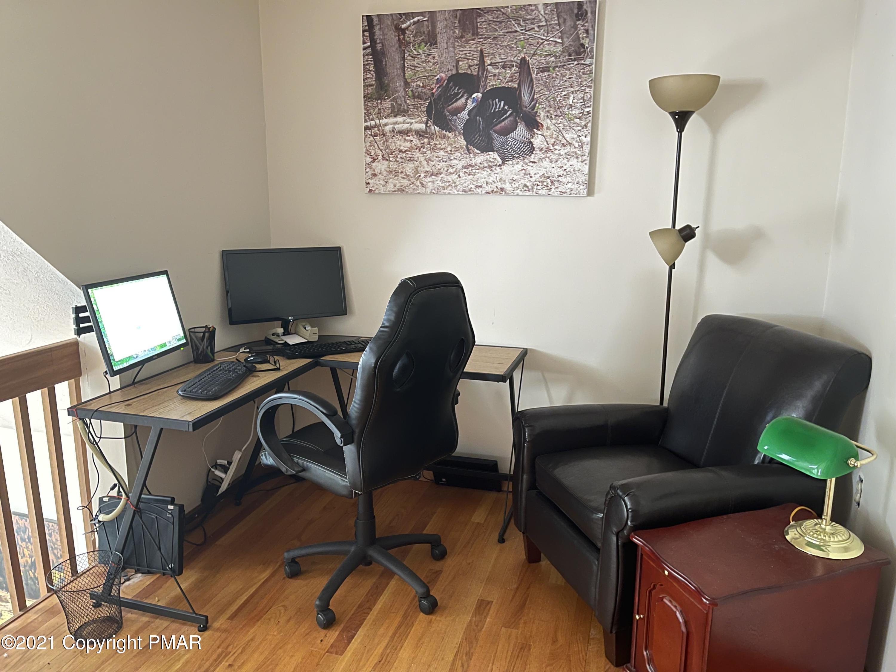 131 Maple Road Blakeslee, PA 18610 - Photo 22 of 35 a view of a workspace with furniture and a window