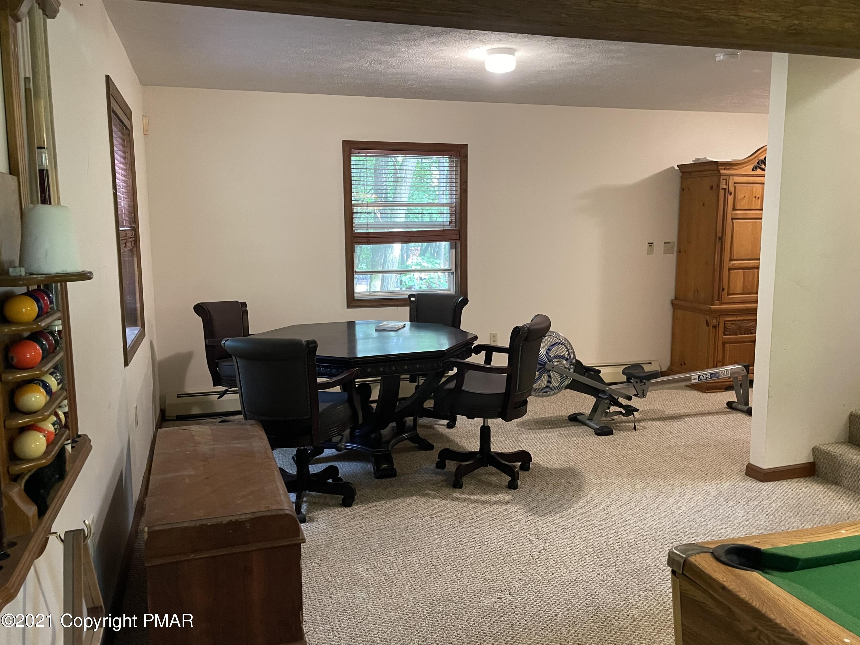 131 Maple Road Blakeslee, PA 18610 - Photo 25 of 35 a view of a workspace with furniture and a window