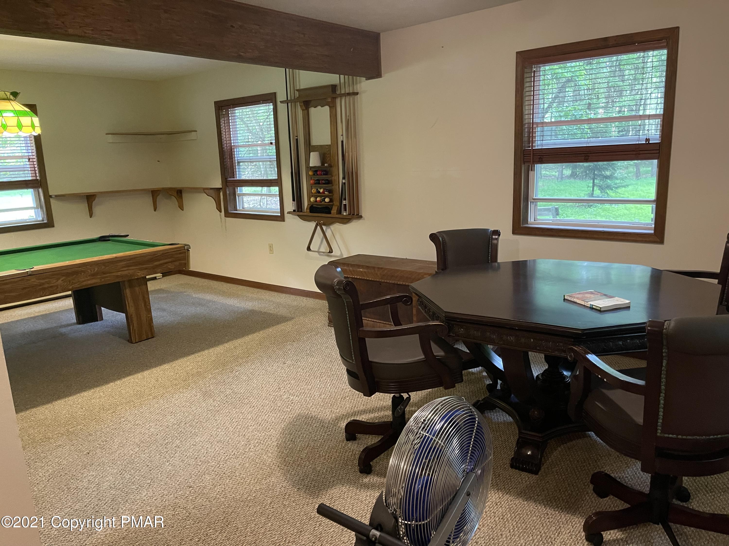 131 Maple Road Blakeslee, PA 18610 - Photo 26 of 35 a view of a workspace with furniture and a window