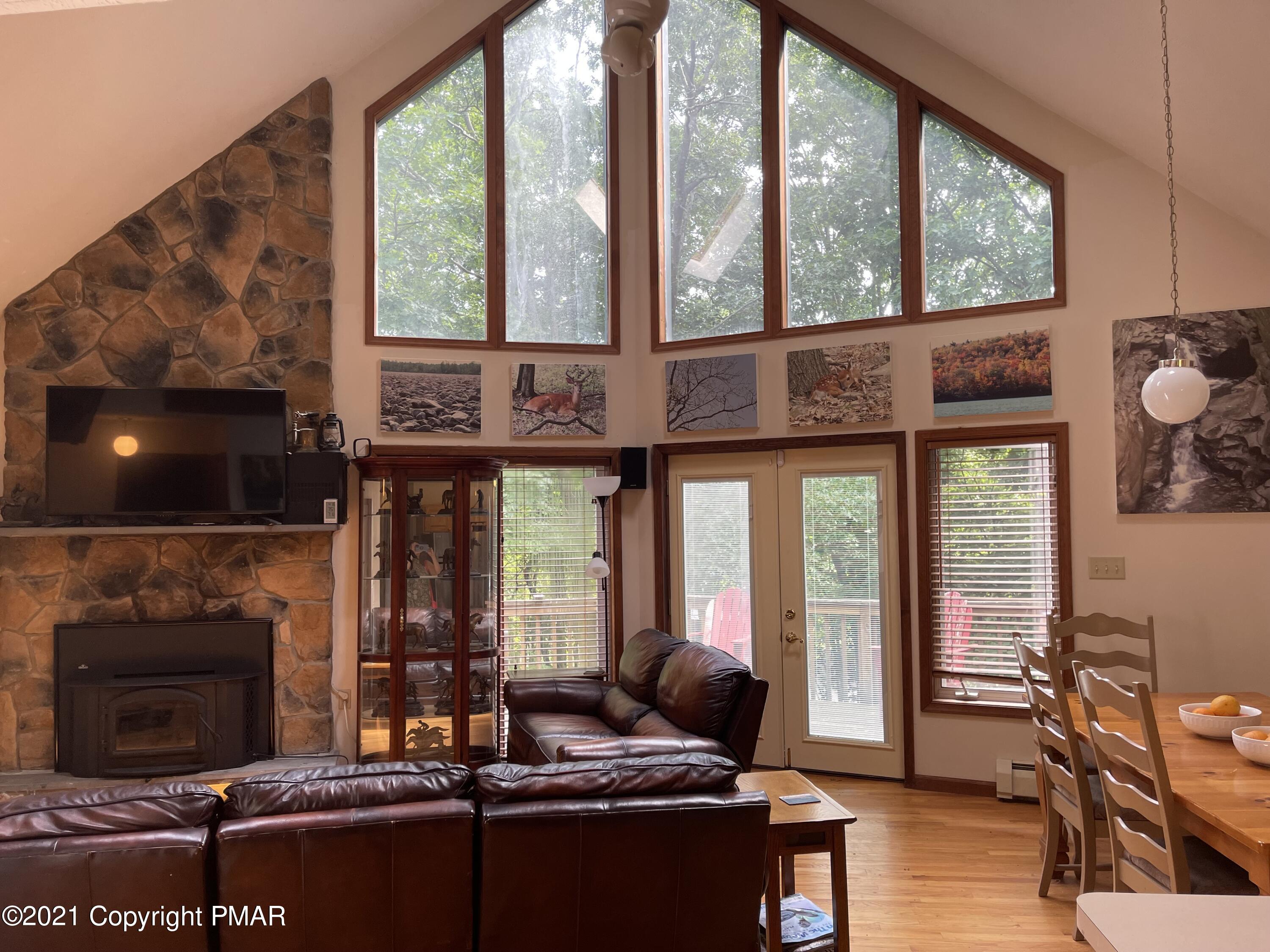 131 Maple Road Blakeslee, PA 18610 - Photo 7 of 35 a living room with furniture and a flat screen tv