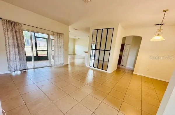 a view of entryway with stairs and a window