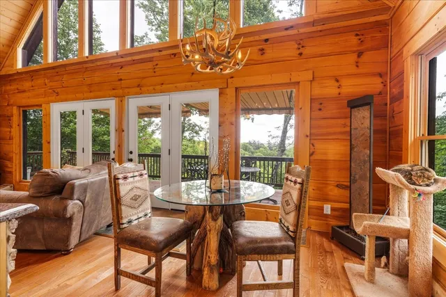 a view of a patio with a table and chairs