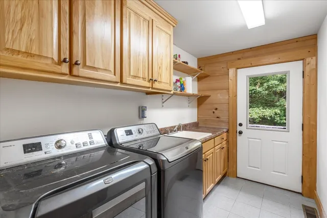 a view of a living room and bathroom