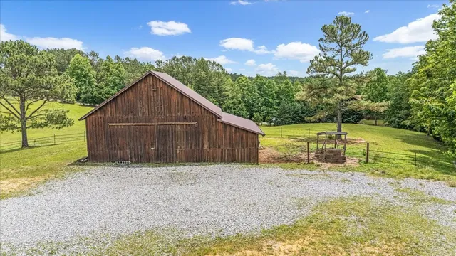 a aerial view of a house with a yard