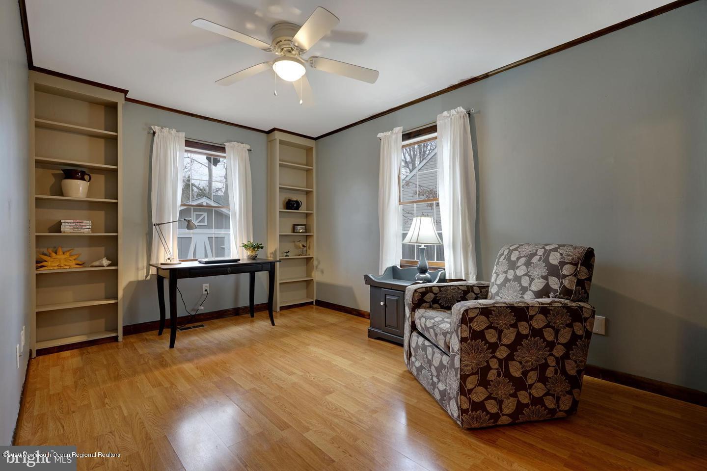 104 Ahoy Road Manahawkin, NJ 08050 - Photo 21 of 32 a bedroom with furniture and a window