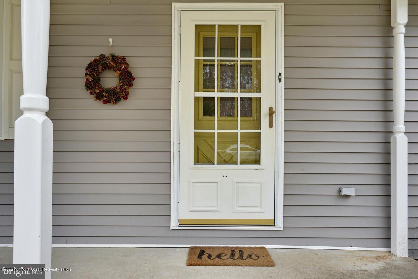 104 Ahoy Road Manahawkin, NJ 08050 - Photo 4 of 32 a view of door with a window