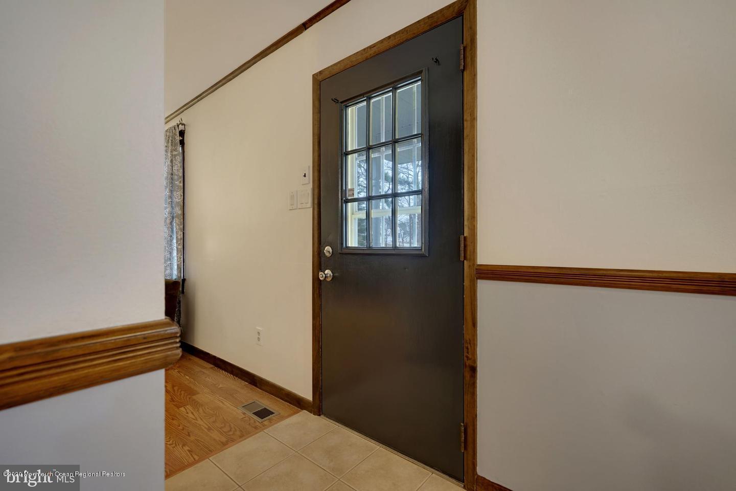 104 Ahoy Road Manahawkin, NJ 08050 - Photo 5 of 32 a view of an entryway