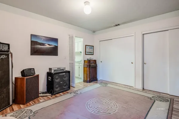 a view of workspace with livingroom view