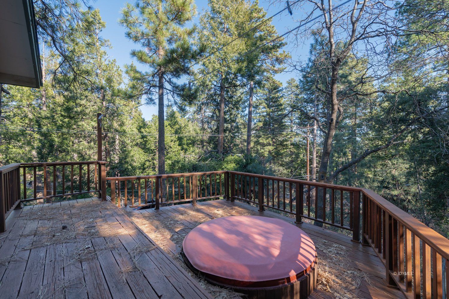 25336 Marion Ridge Drive Idyllwild, CA 92549 - Photo 10 of 18 a view of a roof deck with wooden floor and fence