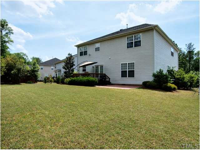 1912 Grace Point Road Morrisville, NC 27560 - Photo 21 of 25 Check out the large/level lot at the back of this home! Many trees and shrubs have been planted at the back to provide the most privacy available. Exterior Back