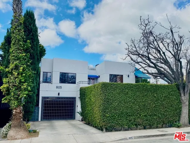 a house view with a outdoor space