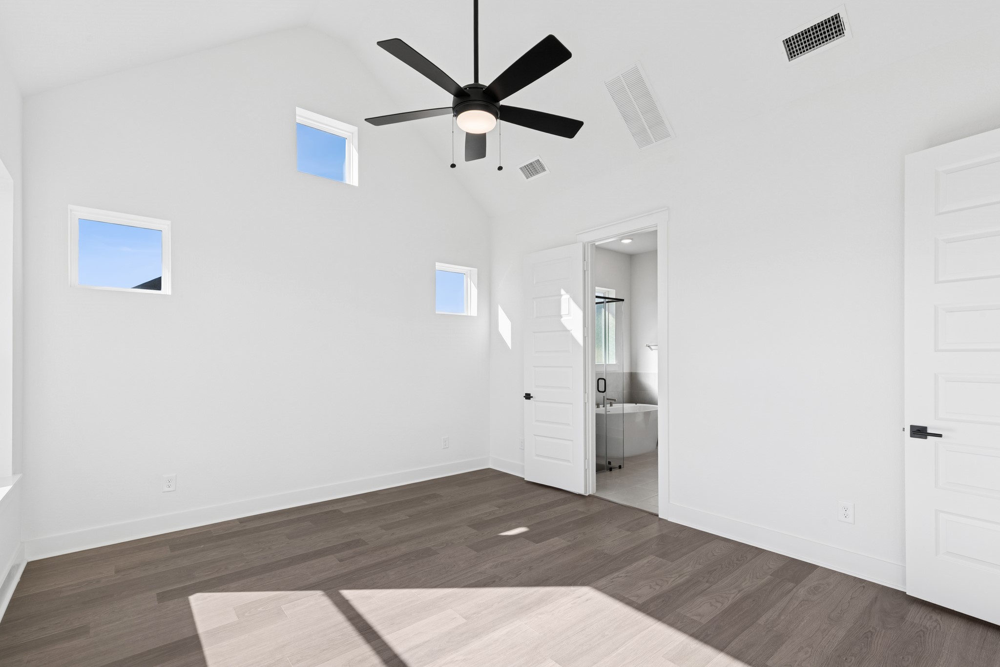 16138 Rita Road Conroe, TX 77302 - Photo 37 of 50 an empty room with closet and a ceiling fan