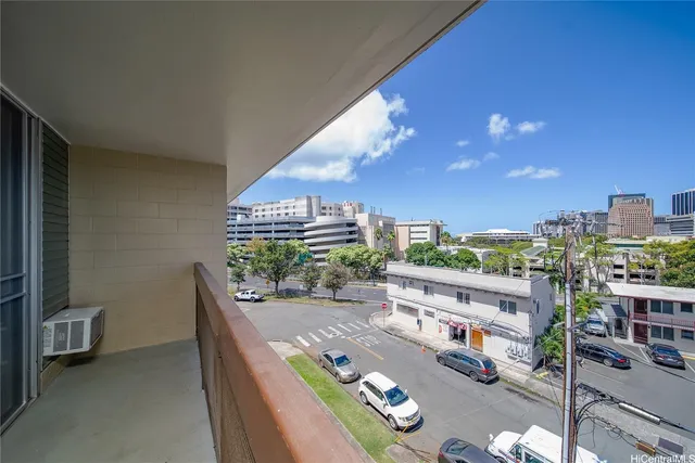 a view of balcony with furniture