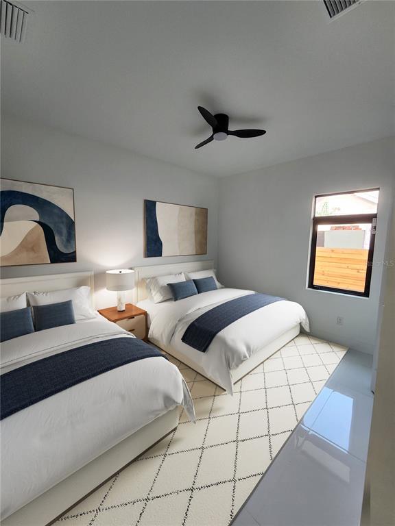 2441 Webber Street Sarasota, FL 34239 - Photo 15 of 19 a bedroom with double bed and a window