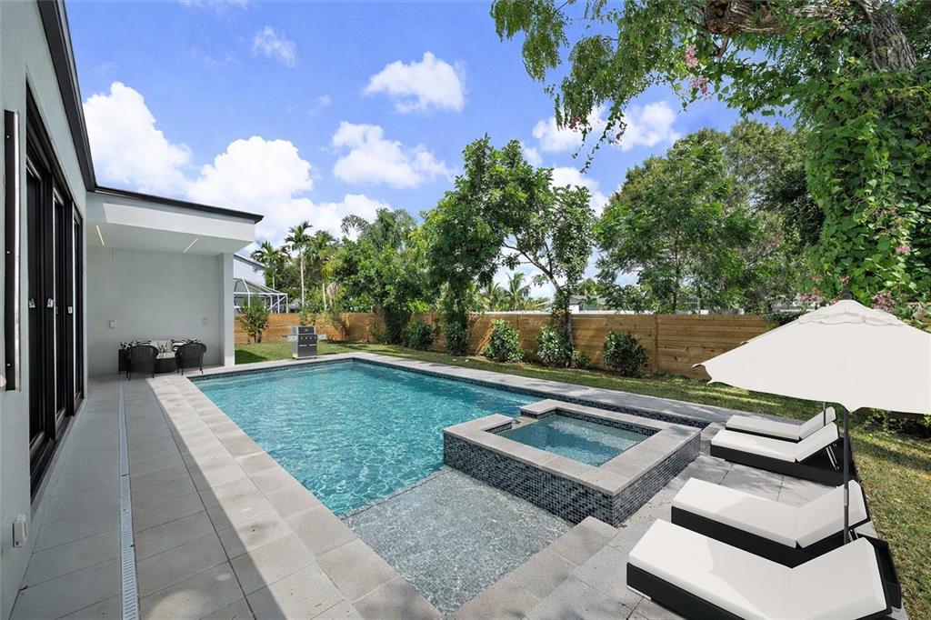 2441 Webber Street Sarasota, FL 34239 - Photo 18 of 19 a view of a backyard with sitting area