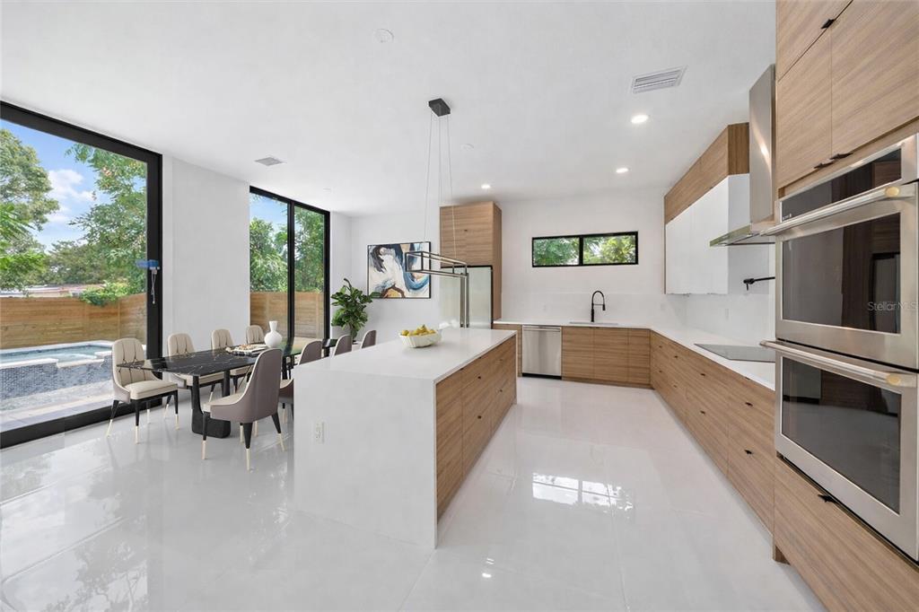 2441 Webber Street Sarasota, FL 34239 - Photo 4 of 19 a large white room with a large window