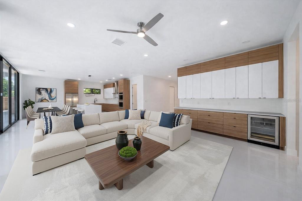 2441 Webber Street Sarasota, FL 34239 - Photo 6 of 19 a living room with furniture and a fireplace