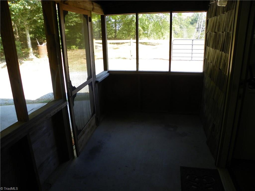 2916 Tyro Road Lexington, NC 27295 - Photo 8 of 10 Screened in back porch