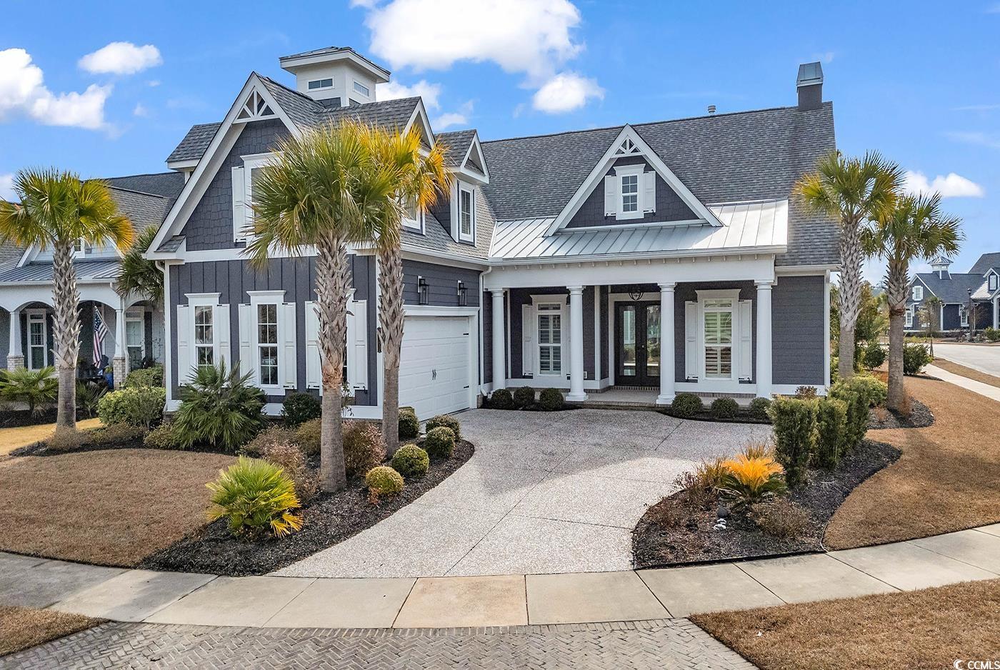 View of front of home featuring a garage