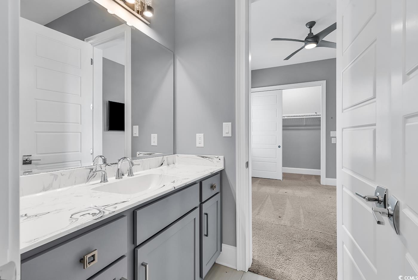 5960 Bolsena Place Myrtle Beach, SC 29572 - Photo 22 of 40 Bathroom featuring vanity and ceiling fan