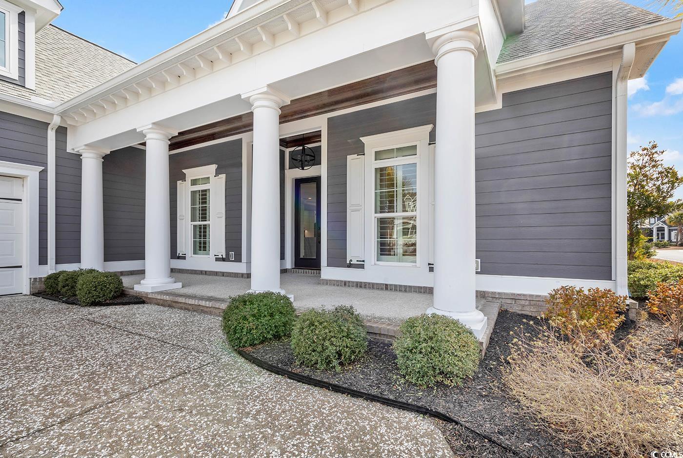 5960 Bolsena Place Myrtle Beach, SC 29572 - Photo 3 of 40 Entrance to property featuring covered porch