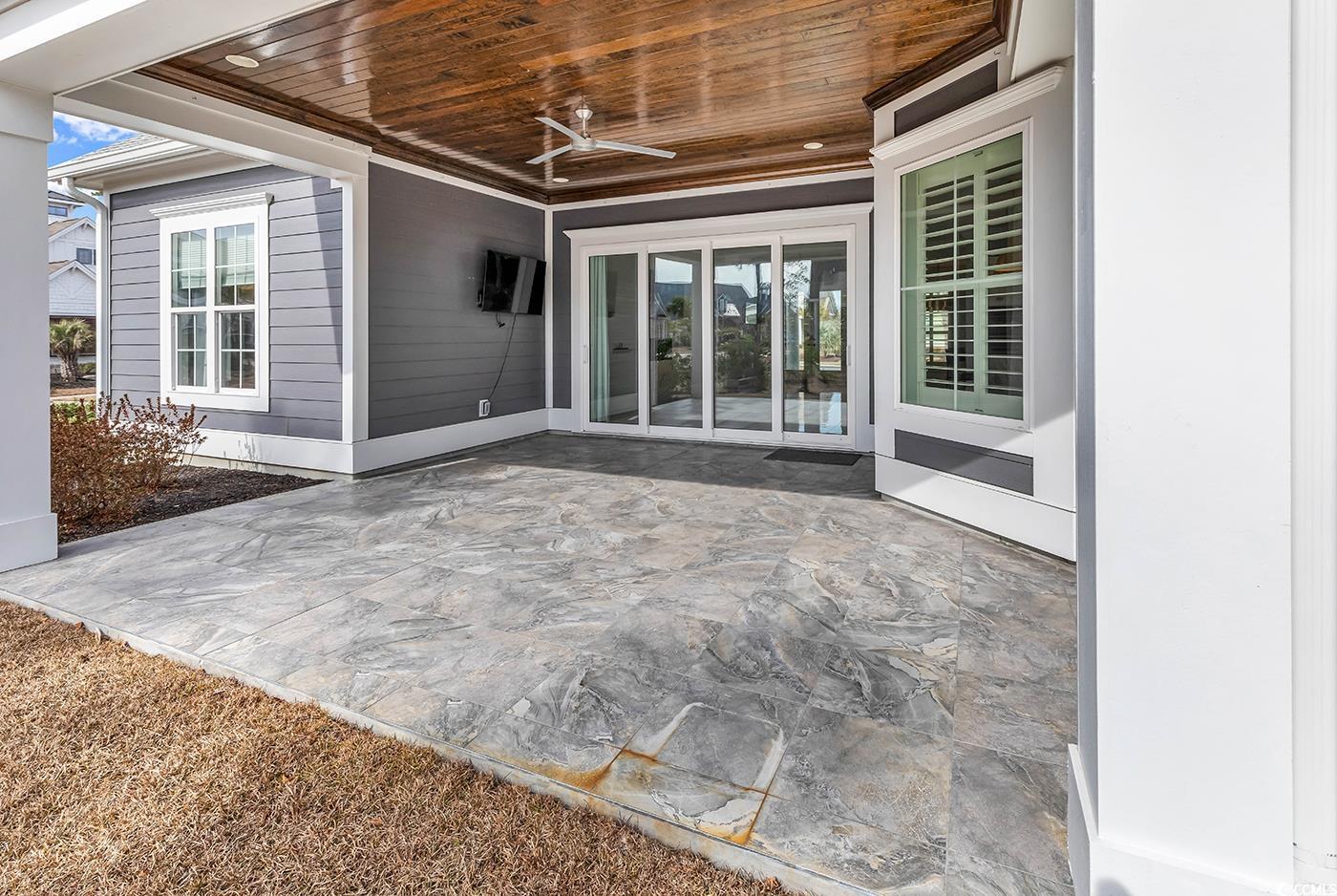 5960 Bolsena Place Myrtle Beach, SC 29572 - Photo 31 of 40 View of patio with ceiling fan