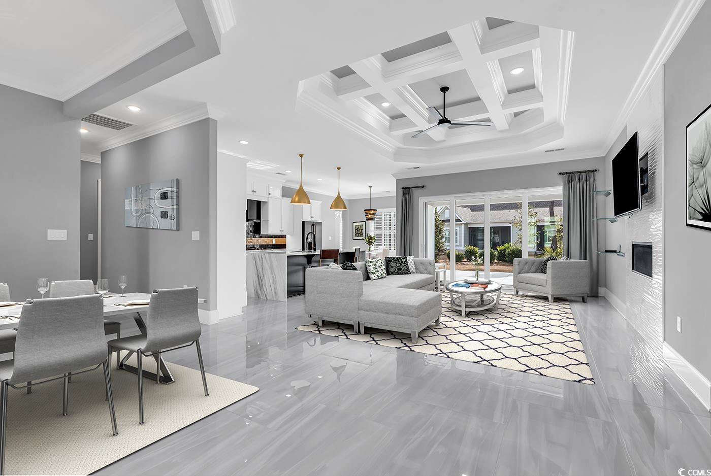 5960 Bolsena Place Myrtle Beach, SC 29572 - Photo 5 of 40 Living room with beamed ceiling, ornamental molding, coffered ceiling, and ceiling fan