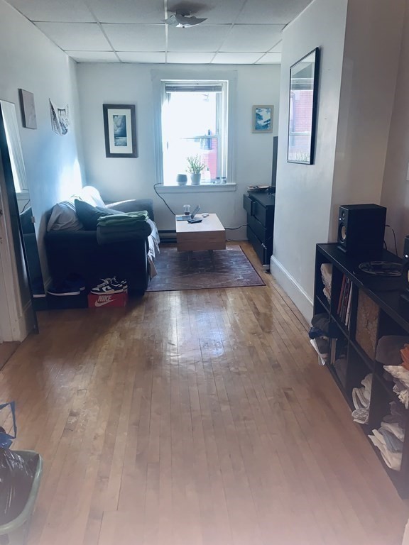144-144A Salem Street Boston, MA 02113 - Photo 17 of 31 a living room with furniture