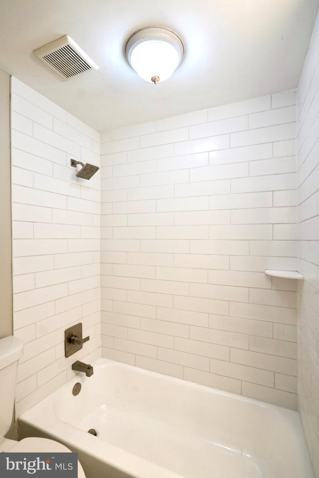 2655 Cedar Street Philadelphia, PA 19125 - Photo 14 of 22 a bathroom with a bathtub