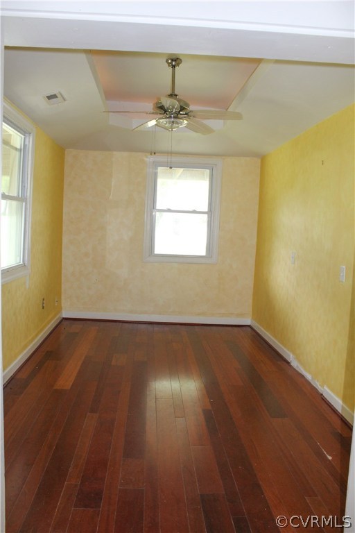 2729 Arritt Road Partlow, VA 22534 - Photo 17 of 30 an empty room with wooden floor chandelier fan and windows