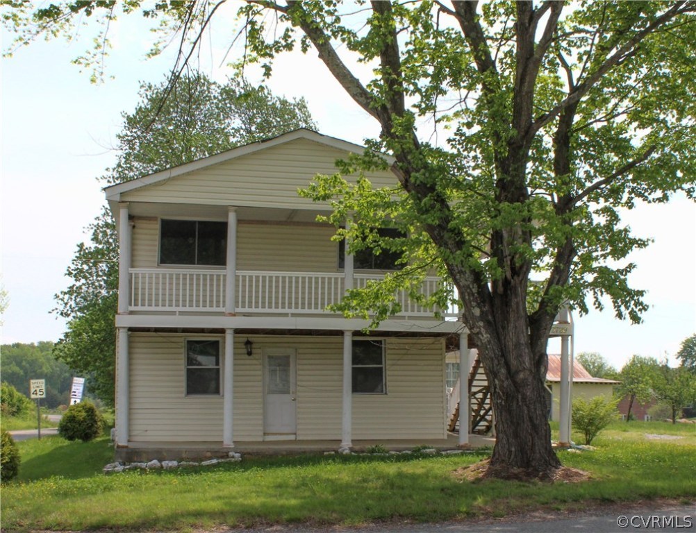 2729 Arritt Road Partlow, VA 22534 - Photo 2 of 30 a house with a tree in front of it