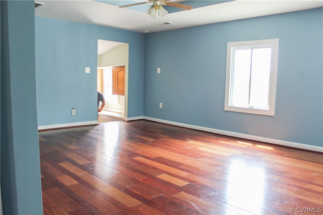 2729 Arritt Road Partlow, VA 22534 - Photo 27 of 30 an empty room with wooden floor and windows