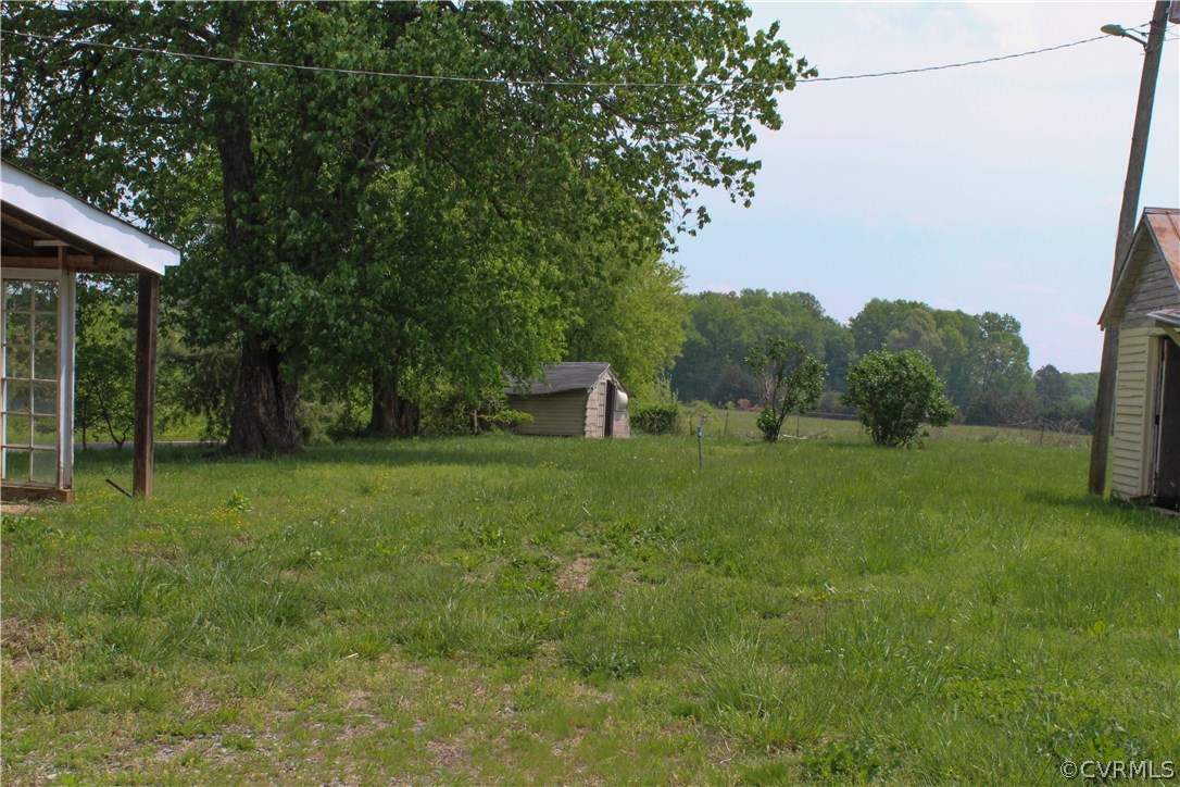2729 Arritt Road Partlow, VA 22534 - Photo 6 of 30 a backyard of a house with lots of green space
