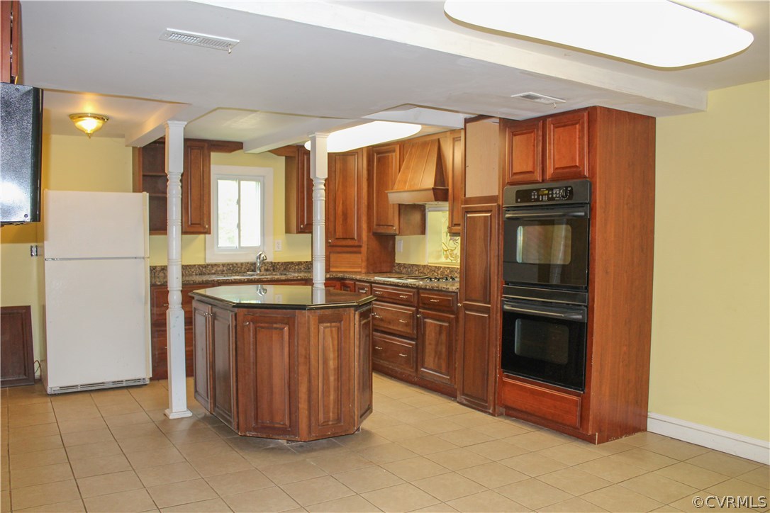 2729 Arritt Road Partlow, VA 22534 - Photo 9 of 30 a kitchen with stainless steel appliances granite countertop a refrigerator and a sink