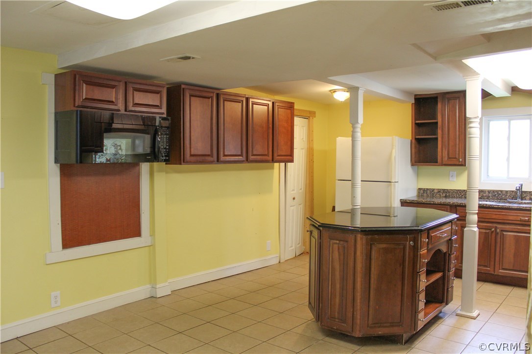 2729 Arritt Road Partlow, VA 22534 - Photo 10 of 30 a kitchen with stainless steel appliances granite countertop a sink and a refrigerator