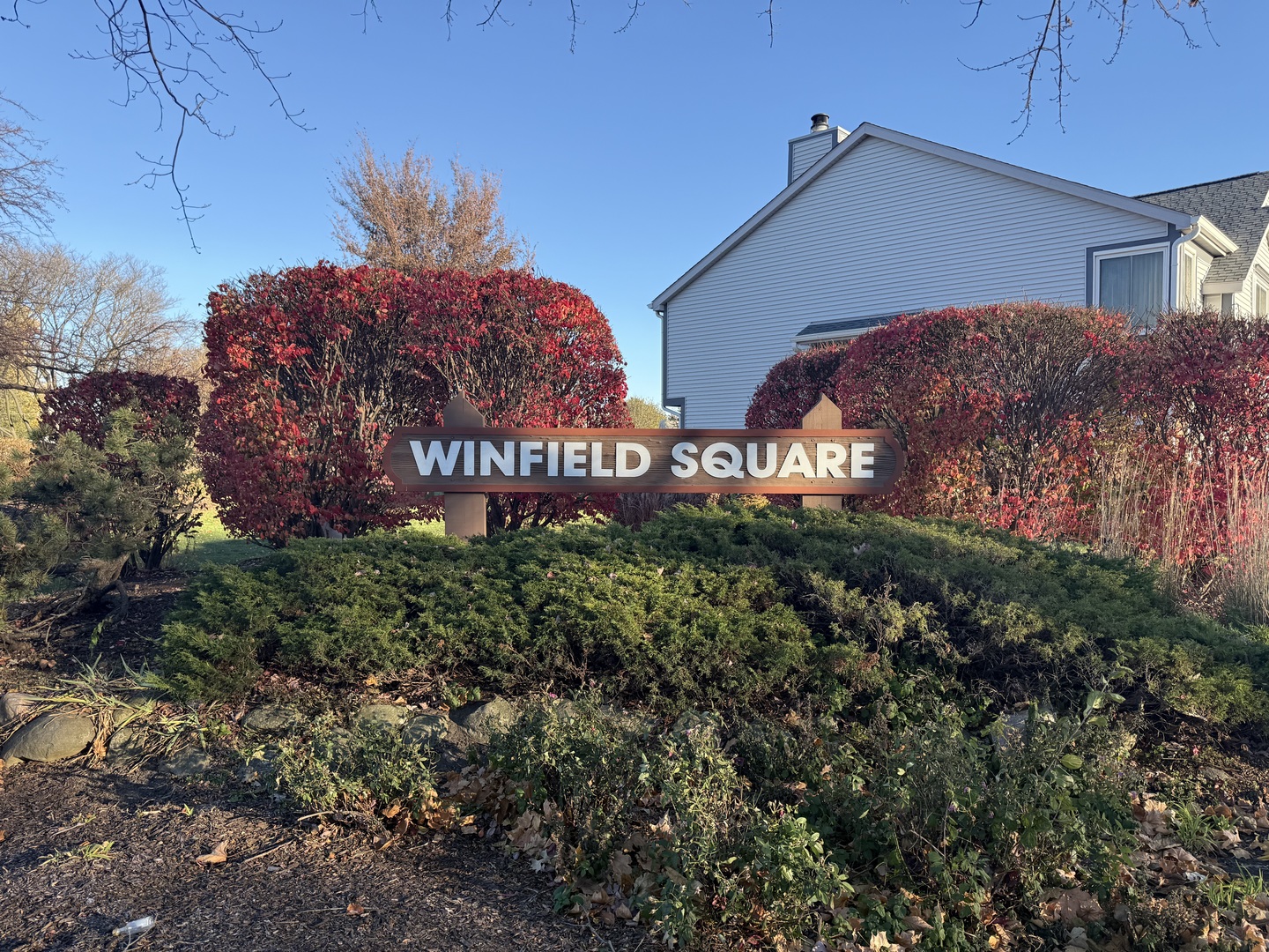 27W210 Providence Lane Winfield, IL 60190 - Photo 12 of 12 a sign on the side of a building