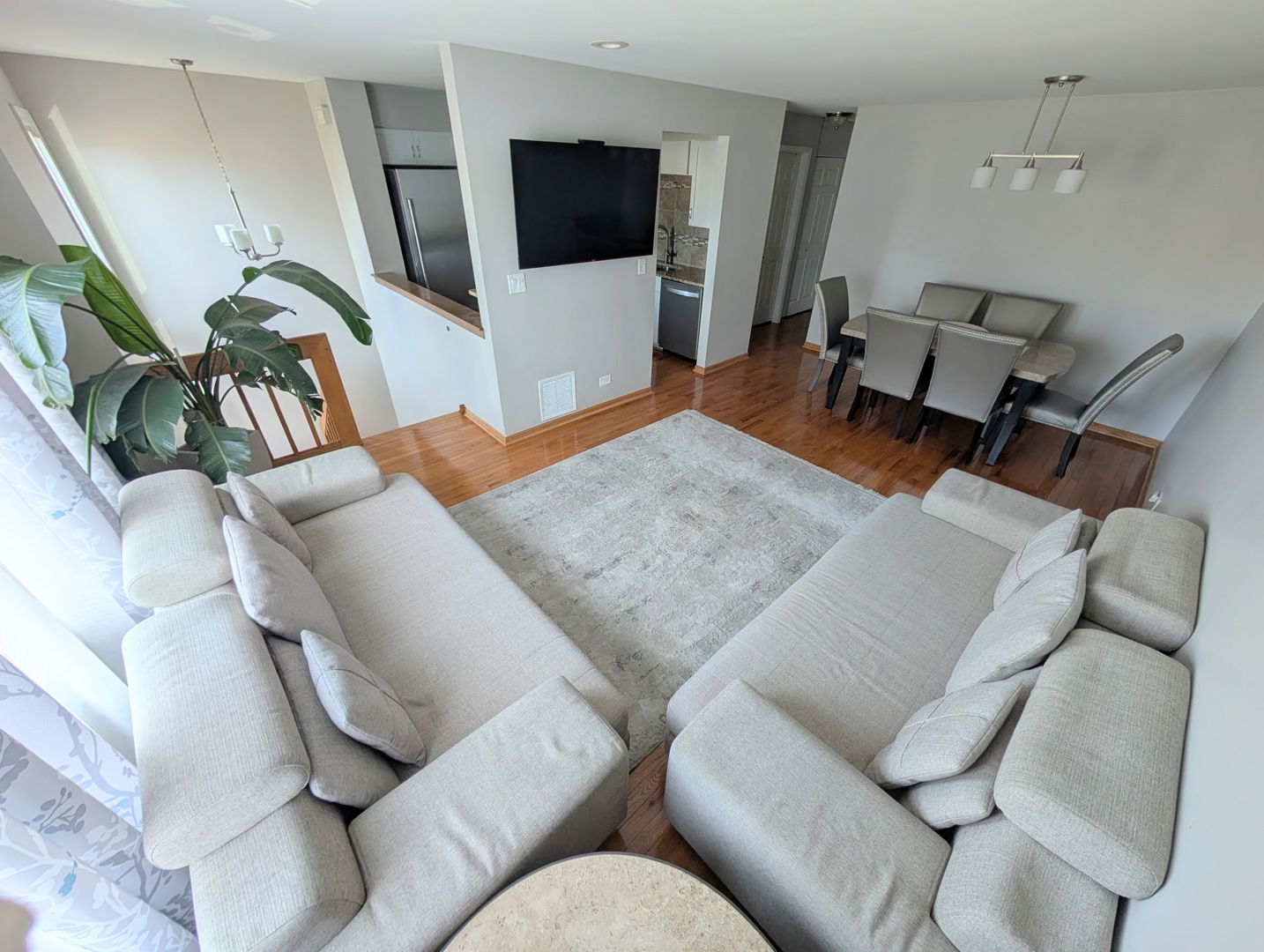 27W210 Providence Lane Winfield, IL 60190 - Photo 6 of 12 a living room with furniture and a flat screen tv