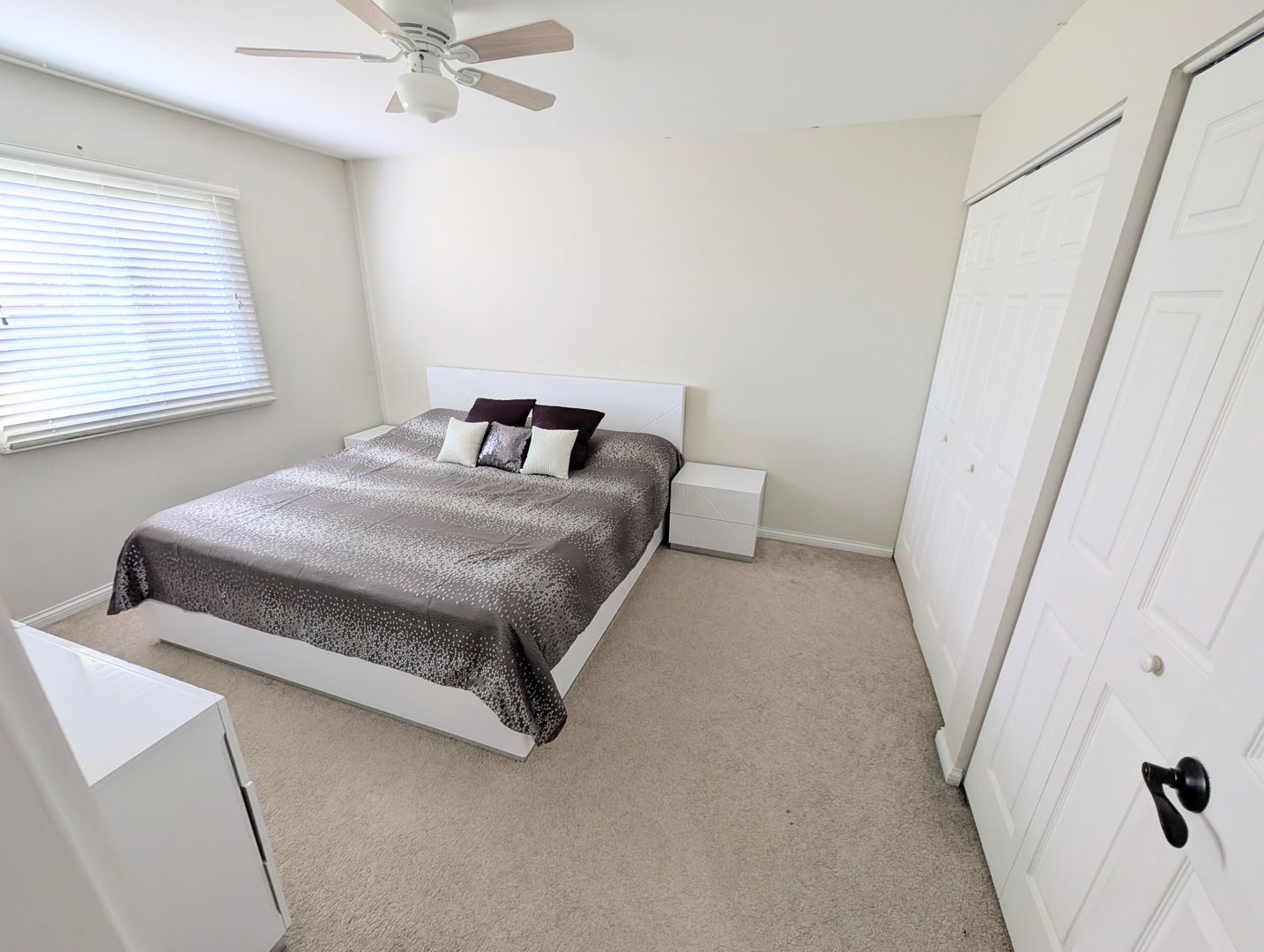 27W210 Providence Lane Winfield, IL 60190 - Photo 7 of 12 a bedroom with a bed and a window