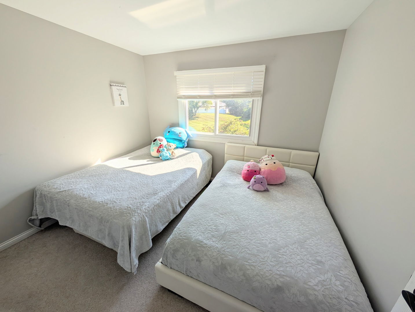 27W210 Providence Lane Winfield, IL 60190 - Photo 9 of 12 a bedroom with a bed and window