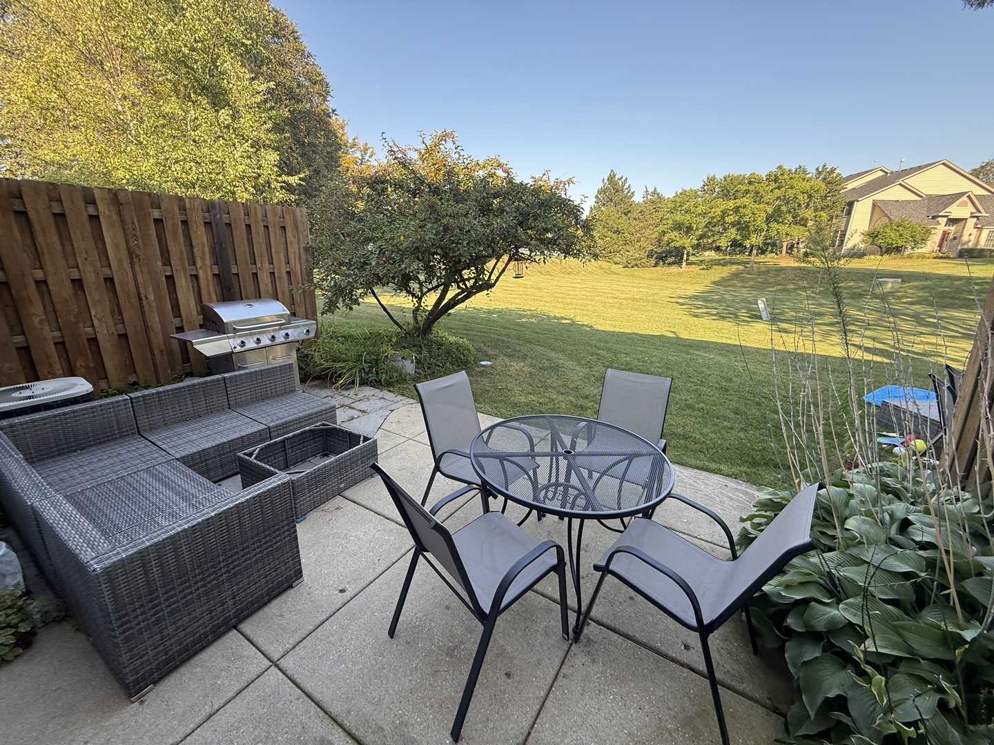 27W210 Providence Lane Winfield, IL 60190 - Photo 10 of 12 a view of a chairs and table on the terrace