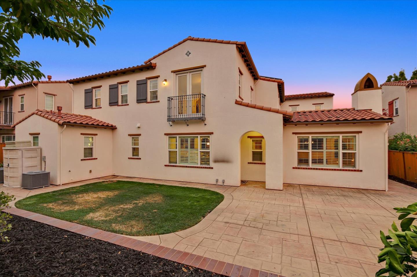 2333 Poppyview Avenue San Ramon, CA 94582 - Photo 46 of 65 a view of a white house next to a yard