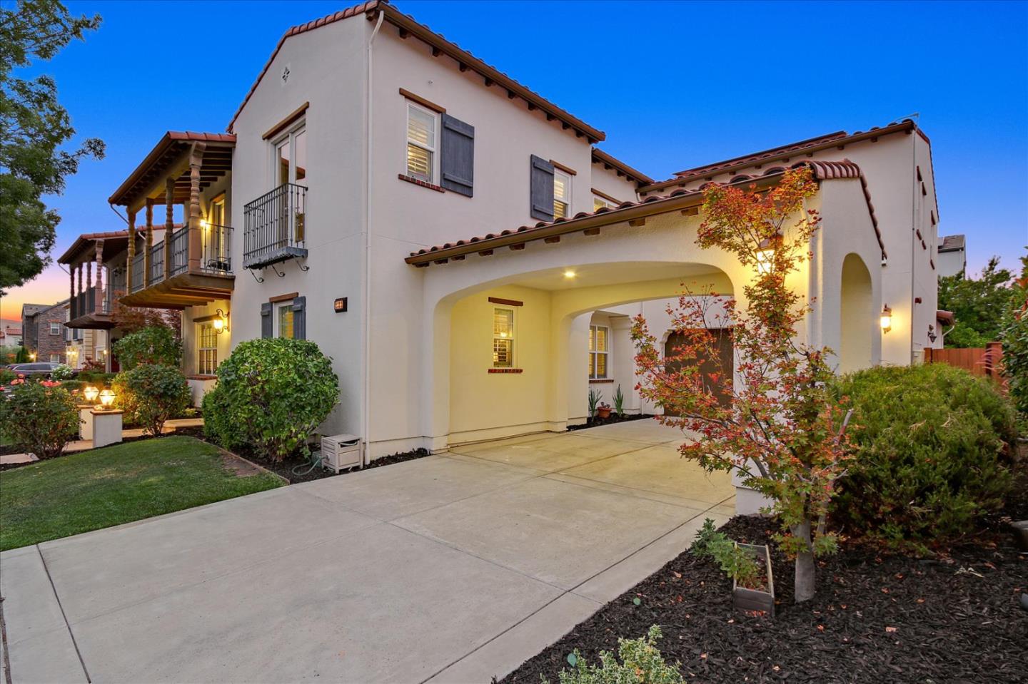 2333 Poppyview Avenue San Ramon, CA 94582 - Photo 51 of 65 a view of a white house with a big yard and potted plants