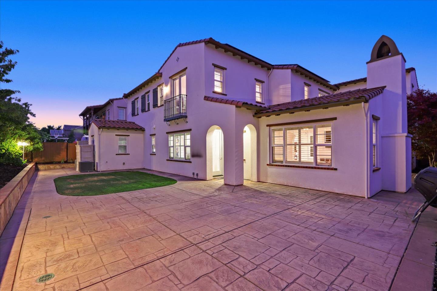 2333 Poppyview Avenue San Ramon, CA 94582 - Photo 60 of 65 a front view of a house with a yard and garage