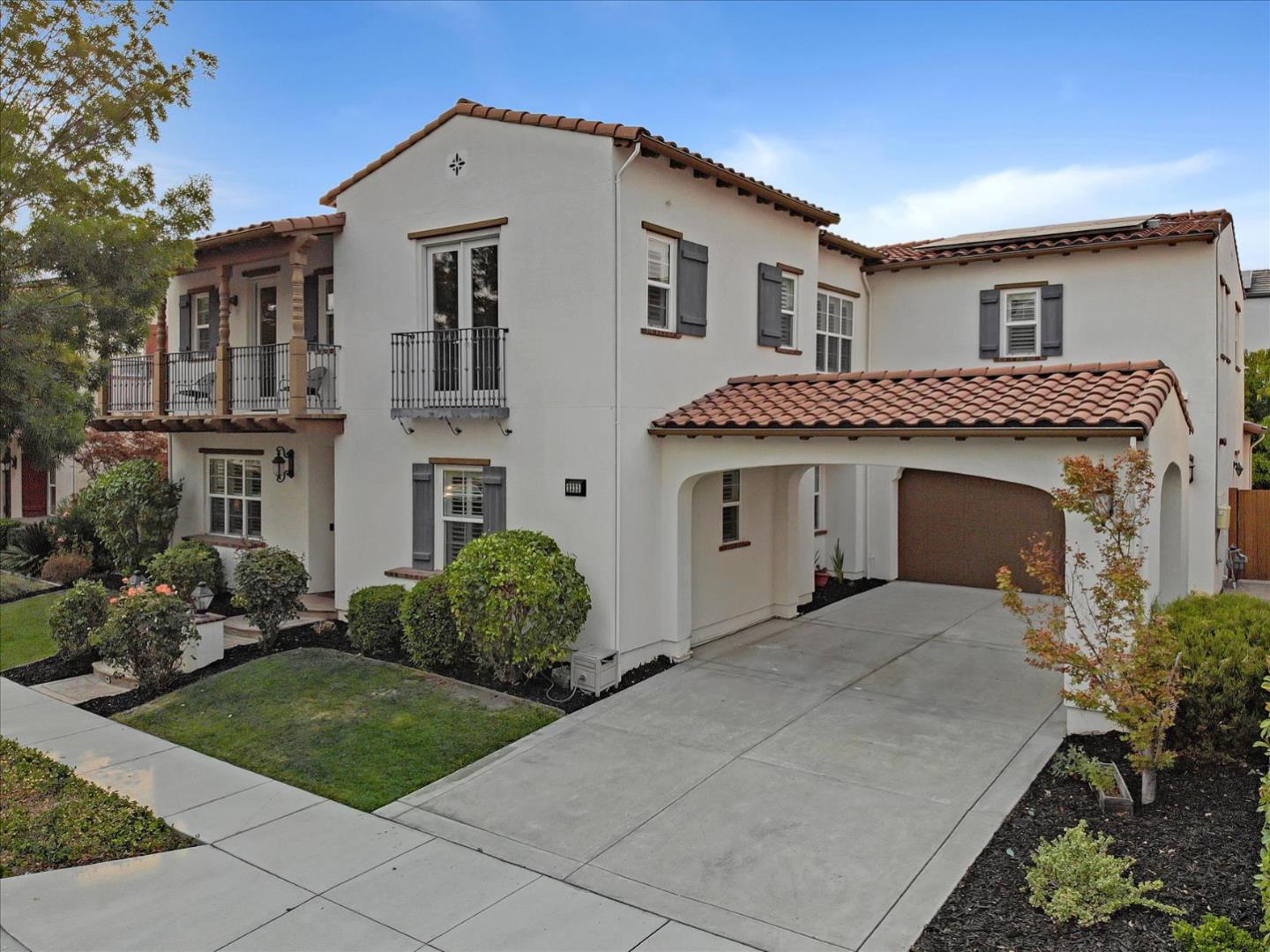 2333 Poppyview Avenue San Ramon, CA 94582 - Photo 62 of 65 a front view of a house with a garden and plants