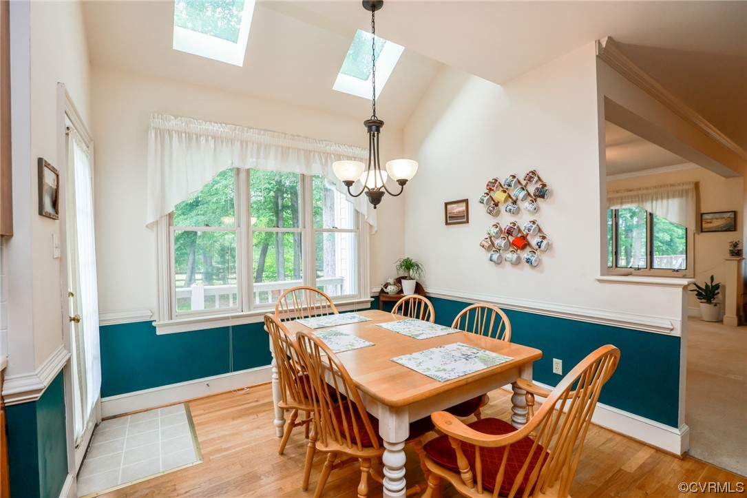 8606 Old Brompton Road Chesterfield, VA 23832 - Photo 13 of 36 a view of a dining room with furniture window and wooden floor