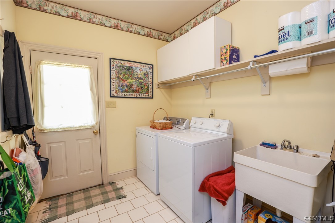 8606 Old Brompton Road Chesterfield, VA 23832 - Photo 14 of 36 a utility room with dryer and washer