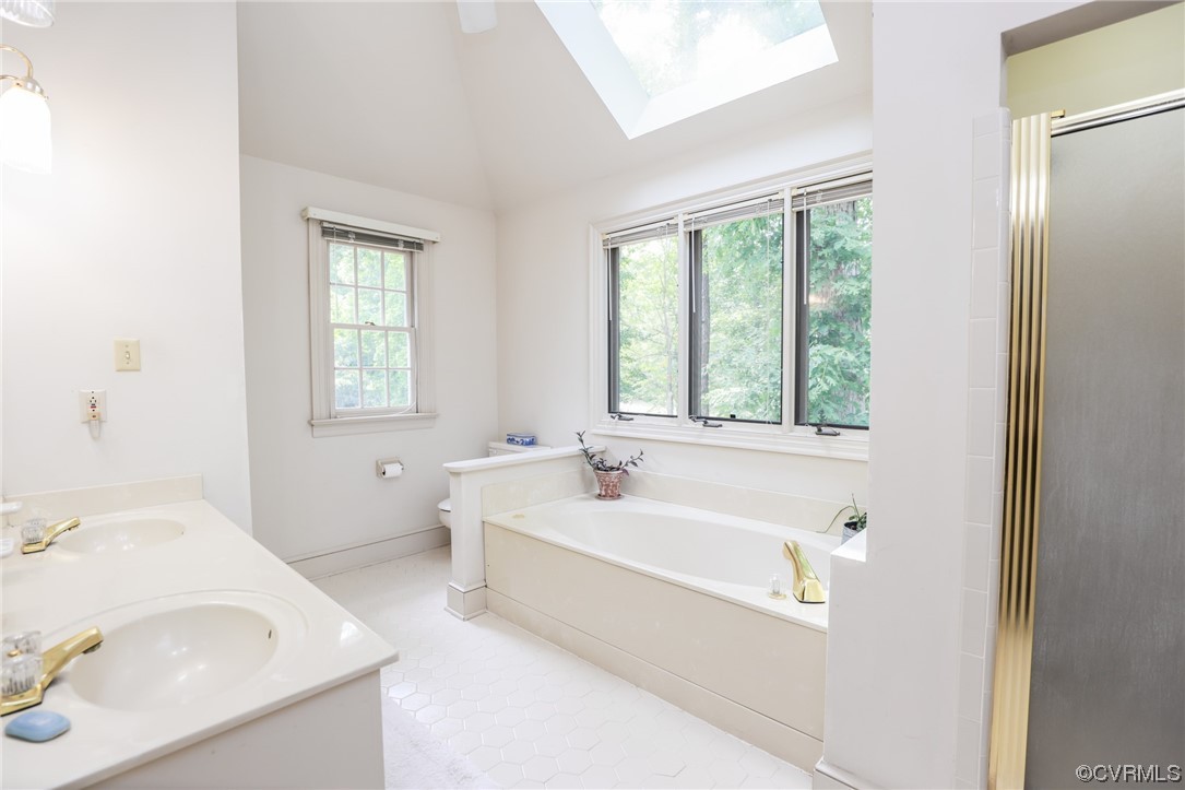 8606 Old Brompton Road Chesterfield, VA 23832 - Photo 27 of 36 a bathroom with a bathtub and a sink