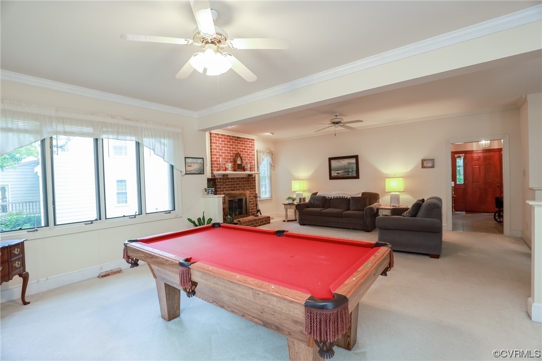 8606 Old Brompton Road Chesterfield, VA 23832 - Photo 9 of 36 a living room with furniture pool table and a ceiling fan